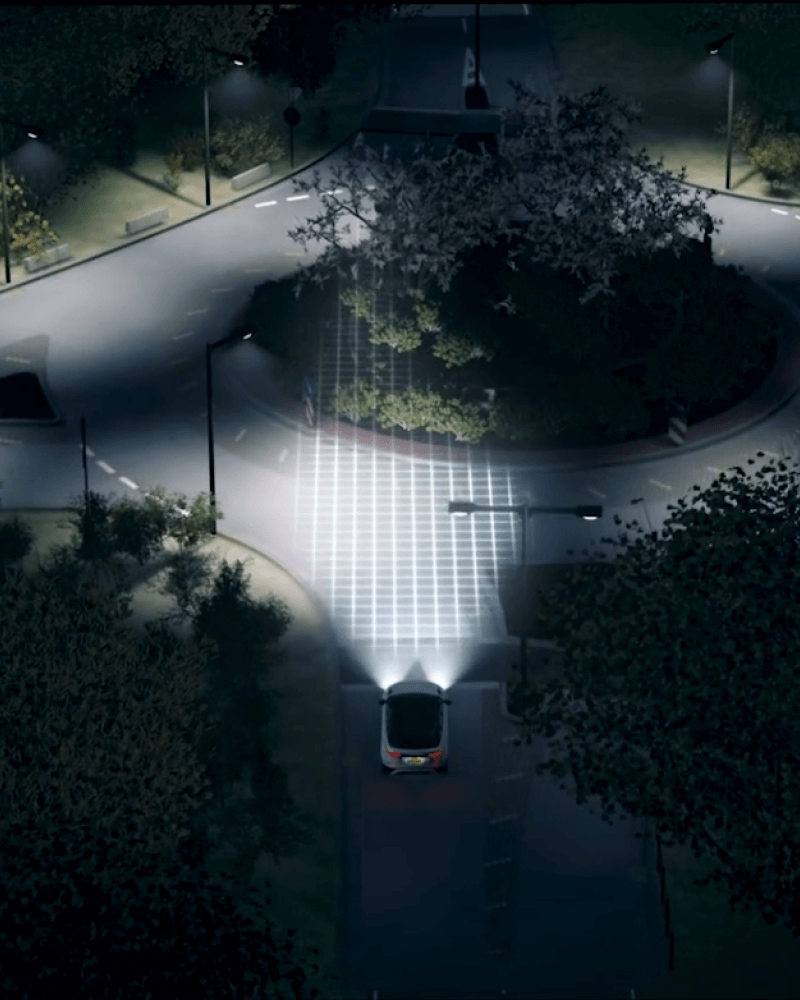 Lighting grid projected onto roundabout on Land Rover